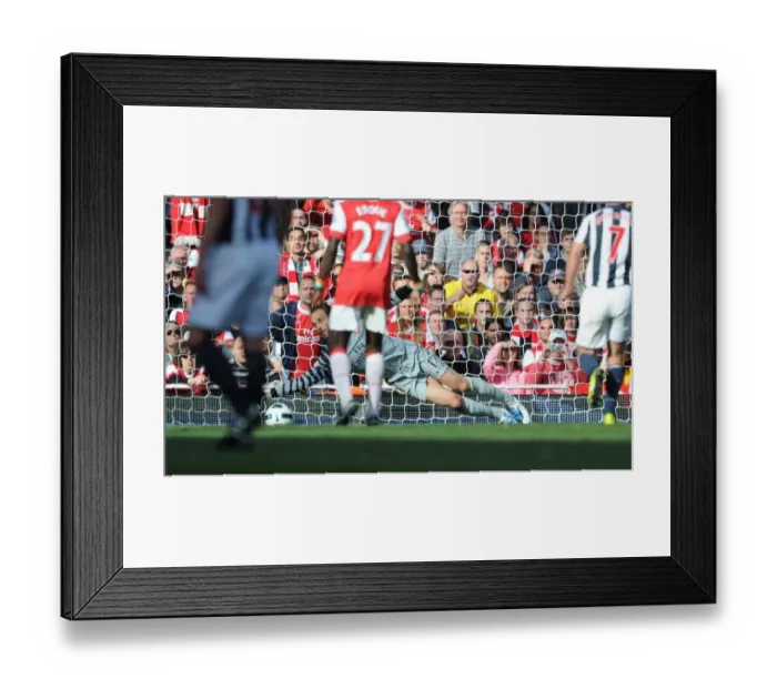 Framed Print : Manuel Almunia (Arsenal) saves the West Brom penalty taken by Chris Brunt