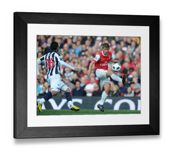 Framed Print : Andrey Arshavin (Arsenal) Gonzalo Jara (WBA). Arsenal 2: 3 West Bromwich Albion Framed Print : Andrey Arshavin (Arsenal) Gonzalo Jara (WBA). Arsenal 2: 3 West Bromwich Albion
