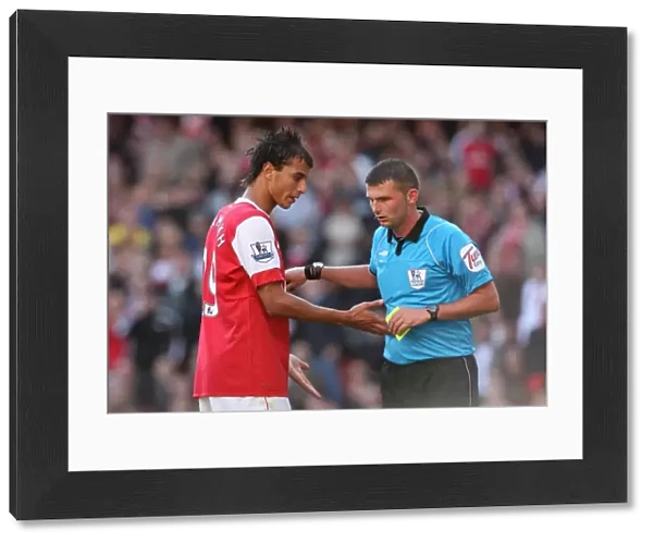Marouane Chamakh (Arsenal) talks to Referee Michael Oliver. Arsenal 2: 3 West Bromwich Albion