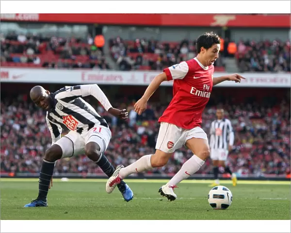 Samir Narsi (Arsenal) beats Youssouf Mulumbu (WBA) on his way to scoring Arsenals 1st goal