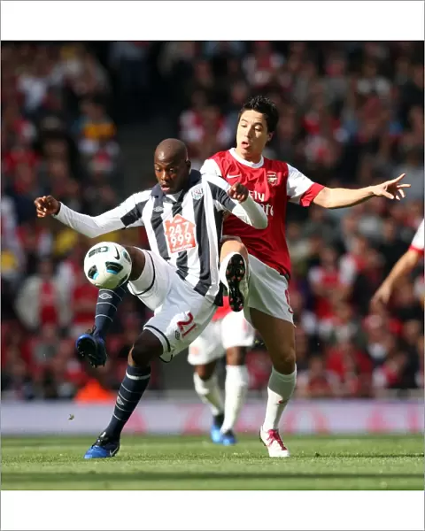 Samir Nasri (Arsenal) Youssouf Mulumbu (WBA). Arsenal 2: 3 West Bromwich Albion