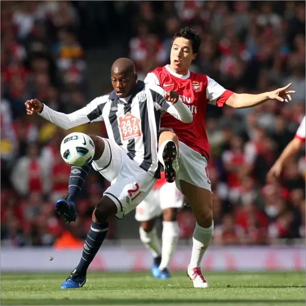 Samir Nasri (Arsenal) Youssouf Mulumbu (WBA). Arsenal 2: 3 West Bromwich Albion