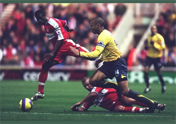 Thierry Henry (Arsenal) George Boateng and Lee Cattermole (Middlesbrough) Middlesbrough 1