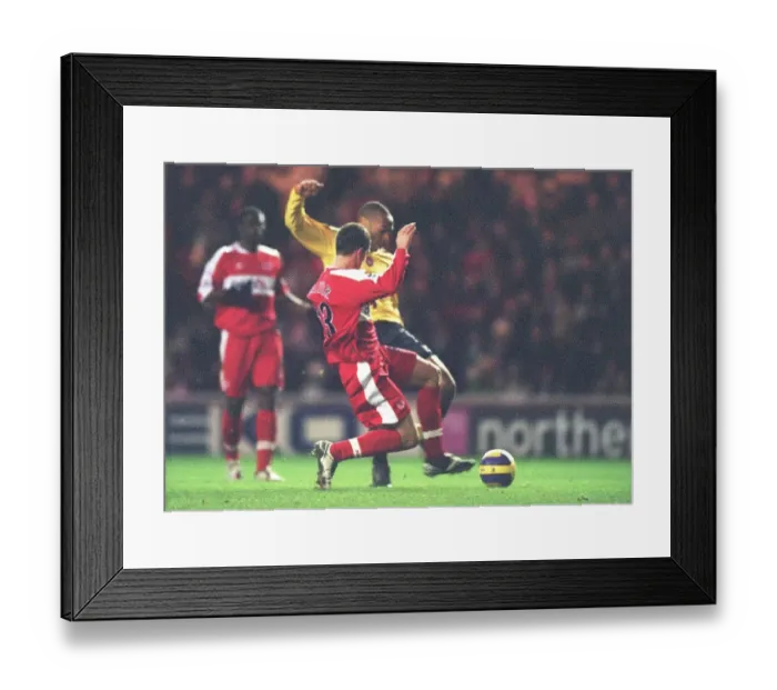 Framed Print : Thierry Henry shoots past Andrew Taylor and Middlesbrough goalkeeper Brad Jones to score the Arsenal goal. Middlesbrough 1: 1 Arsenal, The Premiership, The Riverside Stadium, Middlesbrough, 3 / 2 / 2007. Credit: Stuart MacFarlane / Arsenal Framed Print : Thierry Henry shoots past Andrew Taylor and Middlesbrough goalkeeper Brad Jones to score the Arsenal goal. Middlesbrough 1: 1 Arsenal, The Premiership, The Riverside Stadium, Middlesbrough, 3 / 2 / 2007. Credit: Stuart MacFarlane / Arsenal