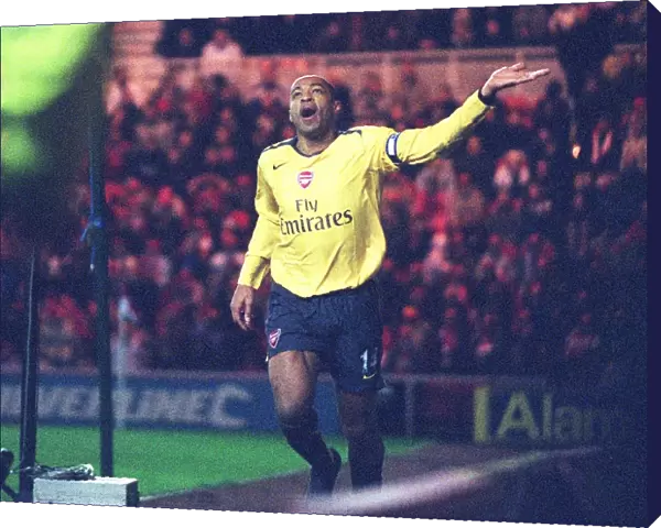Thierry Henry celebrates scoring the Arsenal goal