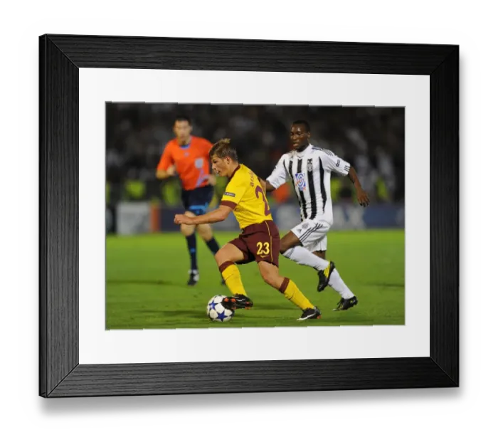 Framed Print : Andrey Arshavin (Arsenal) Medo (Partizan). Partizan Belgrade 1: 3 Arsenal