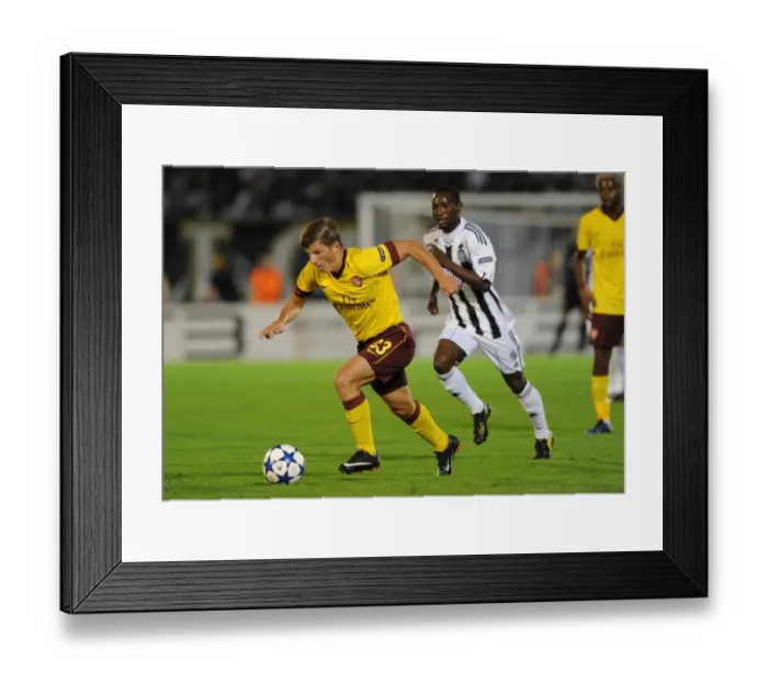 Framed Print : Arsenal's Andrey Arshavin Scores in 3-1 Victory over Partizan's Medo in UEFA Champions League Framed Print : Arsenal's Andrey Arshavin Scores in 3-1 Victory over Partizan's Medo in UEFA Champions League