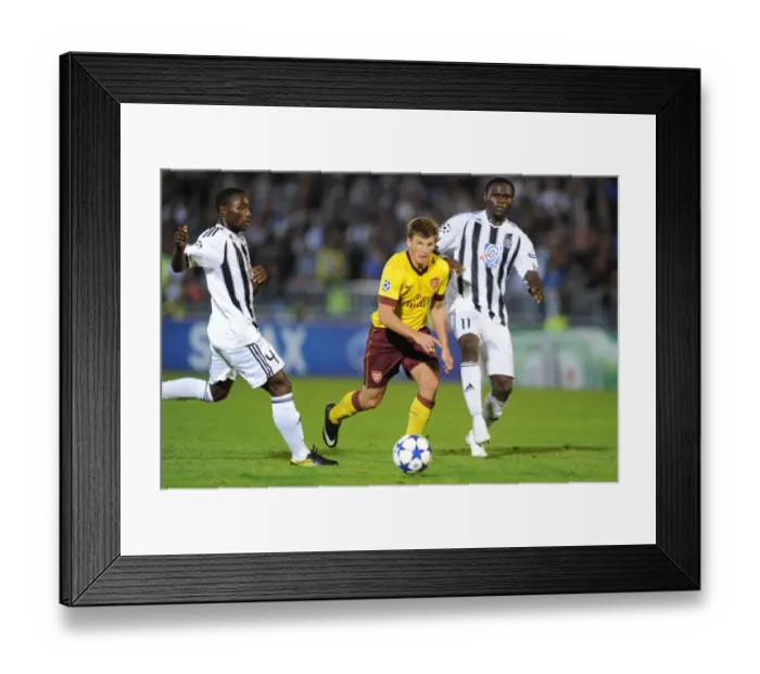 Framed Print : Andrey Arshavin (Arsenal) Medo and Pierre Boya (Partizan). Partizan Belgrade 1: 3 Arsenal