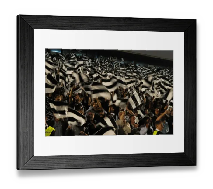 Framed Print : Arsenal's Triumph: 3-1 Over Partizan Belgrade in the UEFA Champions League