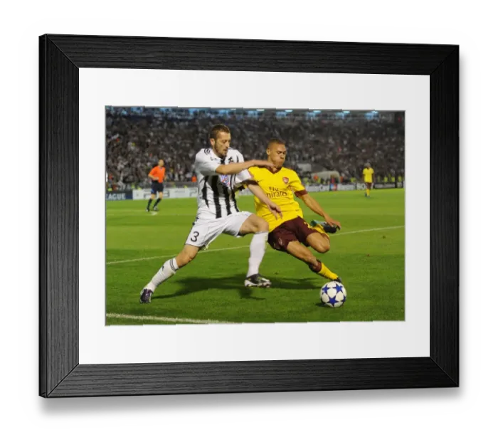 Framed Print : Kieran Gibbs (Arsenal) Ivan Stevanovic (Partizan). Partizan Belgrade 1: 3 Arsenal