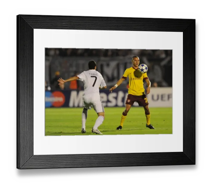 Framed Print : Kieran Gibbs (Arsenal) Nemanja Tomic (Partizan). Partizan Belgrade 1: 3 Arsenal Framed Print : Kieran Gibbs (Arsenal) Nemanja Tomic (Partizan). Partizan Belgrade 1: 3 Arsenal