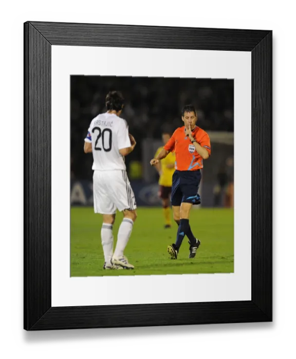 Framed Print : Referee Wolfgang Stark with Patrizan defender Mladen Krstajic. Partizan Belgrade 1