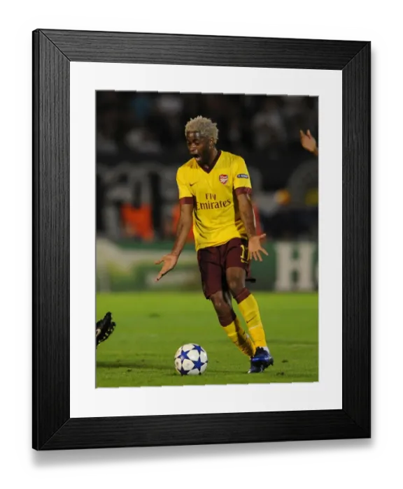Framed Print : Alex Song (Arsenal). Partizan Belgrade 1: 3 Arsenal. UEFA Champions League
