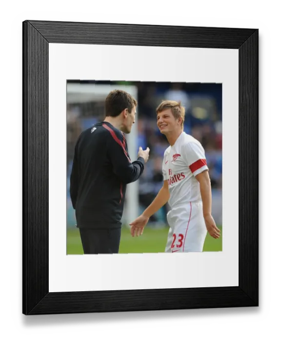 Framed Print : Andrey Arsahvin jokes with Arsenal doctor Gary O Driscoll. Chelsea 2: 0 Arsenal