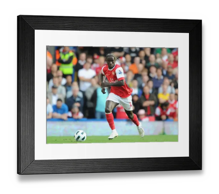 Framed Print : Bacary Sagna Faces Off Against Chelsea at Stamford Bridge in a 2-0 Premier League Battle