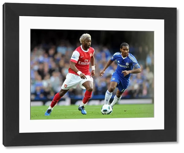 Alex Song (Arsenal) Florent Malouda (Chelsea). Chelsea 2: 0 Arsenal, Barclays Premier League