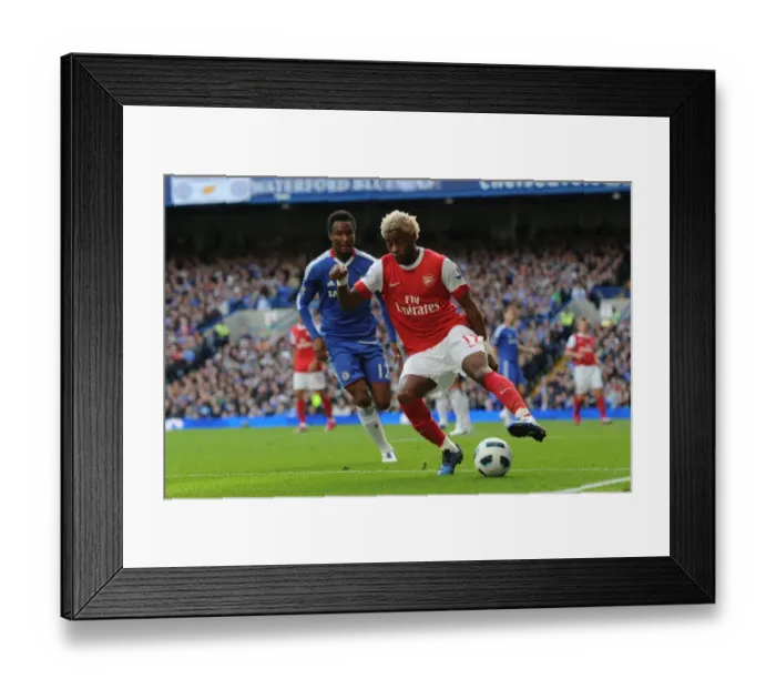 Framed Print : Clash of Midfielders: Mikel vs. Song in Chelsea's 2:0 Victory over Arsenal, Premier League 2010-11