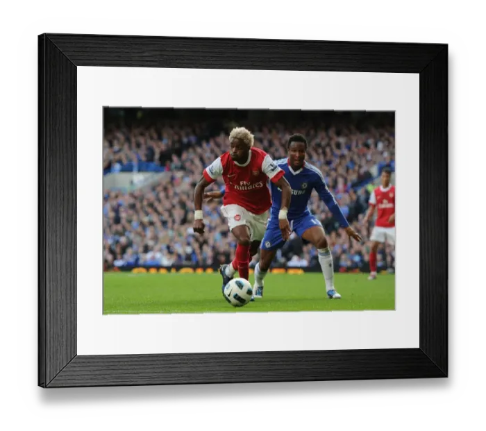 Framed Print : Alex Song (Arsenal) Mikel (Chelsea). Chelsea 2: 0 Arsenal, Barclays Premier League Framed Print : Alex Song (Arsenal) Mikel (Chelsea). Chelsea 2: 0 Arsenal, Barclays Premier League