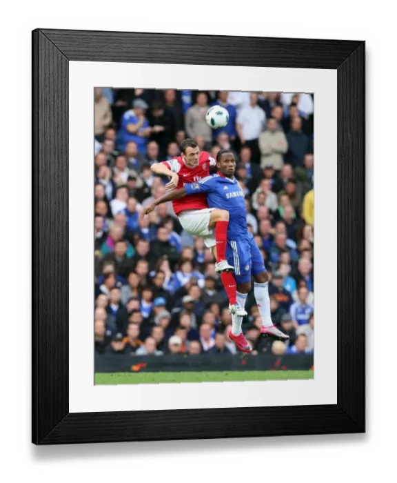 Framed Print : Squillaci vs. Drogba: Chelsea's Victory in the Barclays Premier League (3 / 10 / 10)