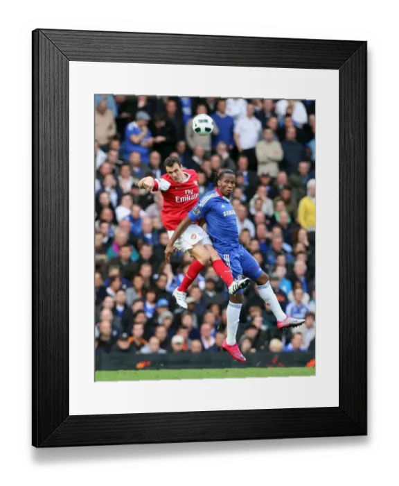 Framed Print : Sebastien Squillaci (Arsenal) Didier Drogba (Chelsea). Chelsea 2: 0 Arsenal