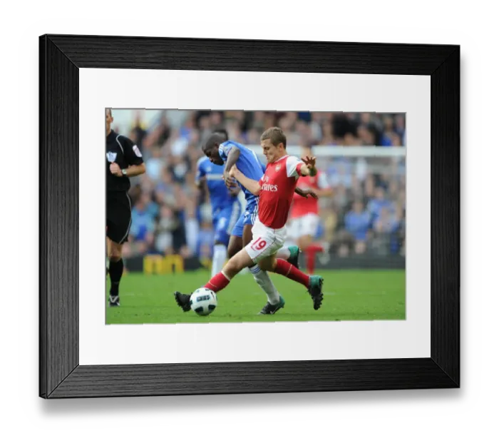 Framed Print : Jack Wilshere (Arsenal) Rameres (Chelsea). Chelsea 2: 0 Arsenal, Barclays Premier League Framed Print : Jack Wilshere (Arsenal) Rameres (Chelsea). Chelsea 2: 0 Arsenal, Barclays Premier League