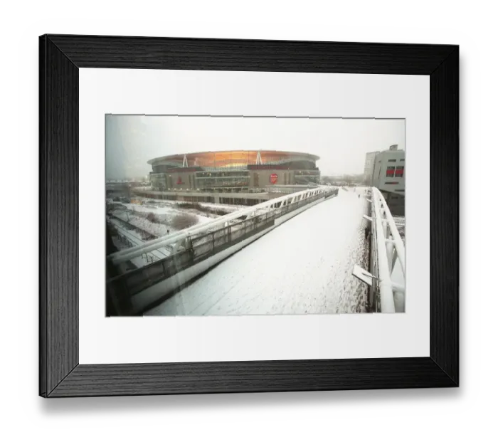 Framed Print : Winter's Enchantment at Emirates: A Football Wonderland in Snow