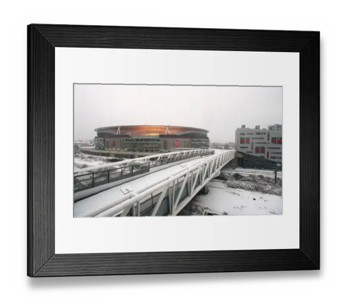 Framed Print : Winter's Enchantment at Emirates: Arsenal's Stadium Blanketed in Snow Framed Print : Winter's Enchantment at Emirates: Arsenal's Stadium Blanketed in Snow