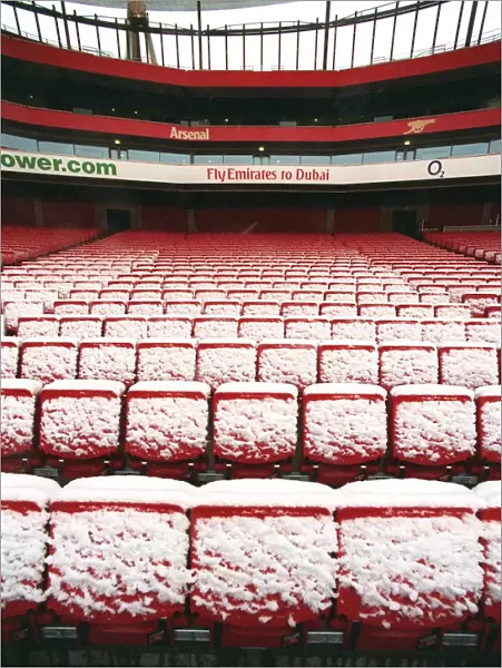 Winter's Magic at Emirates: A Snowy Arsenal Football Stadium