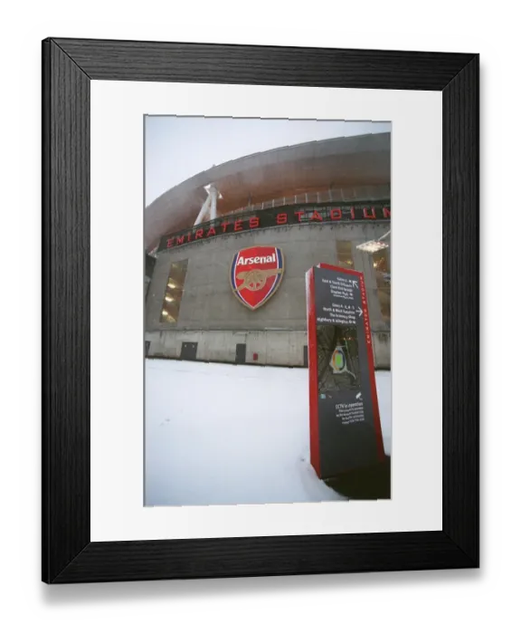 Framed Print : Winter's Enchantment at Emirates: A Football Stadium Blanketed in Snow Framed Print : Winter's Enchantment at Emirates: A Football Stadium Blanketed in Snow
