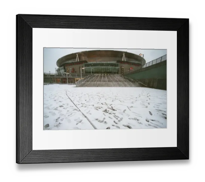 Framed Print : Winter's Enchantment at Emirates: A Football Wonderland in Snow