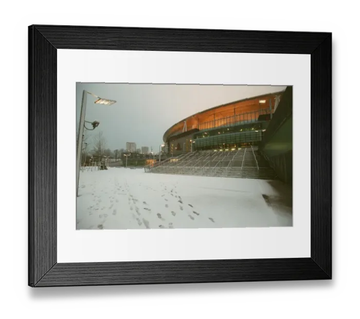 Framed Print : Winter's Enchantment at Emirates: A Football Wonderland in Snow