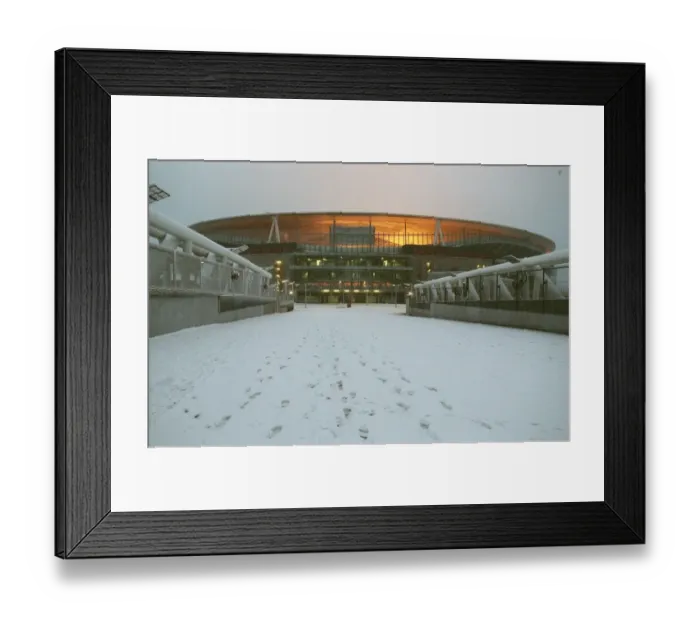 Framed Print : Winter's Enchantment at Emirates: Arsenal's Stadium Blanketed in Snow