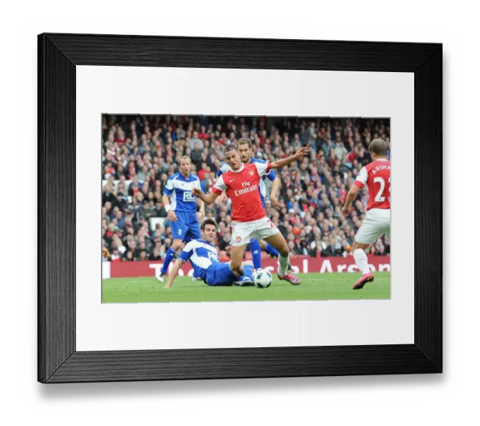 Framed Print : Marouane Chamakh is tripped by Scott Dann (Birmingham) for the Arsenal penalty Framed Print : Marouane Chamakh is tripped by Scott Dann (Birmingham) for the Arsenal penalty