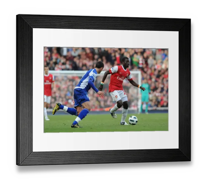 Framed Print : Emmanuel Eboue (Arsenal) Keith Fahey (Birmingham). Arsenal 2: 1 Birmingham City Framed Print : Emmanuel Eboue (Arsenal) Keith Fahey (Birmingham). Arsenal 2: 1 Birmingham City