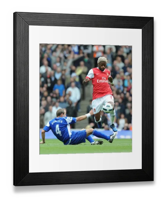 Framed Print : Arsenal's Alex Song Scores Against Lee Bowyer and Birmingham City in Premier League Clash
