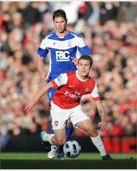 Jack Wilshere (Arsenal) Nikola Zigic (Birmingham). Arsenal 2: 1 Birmingham City