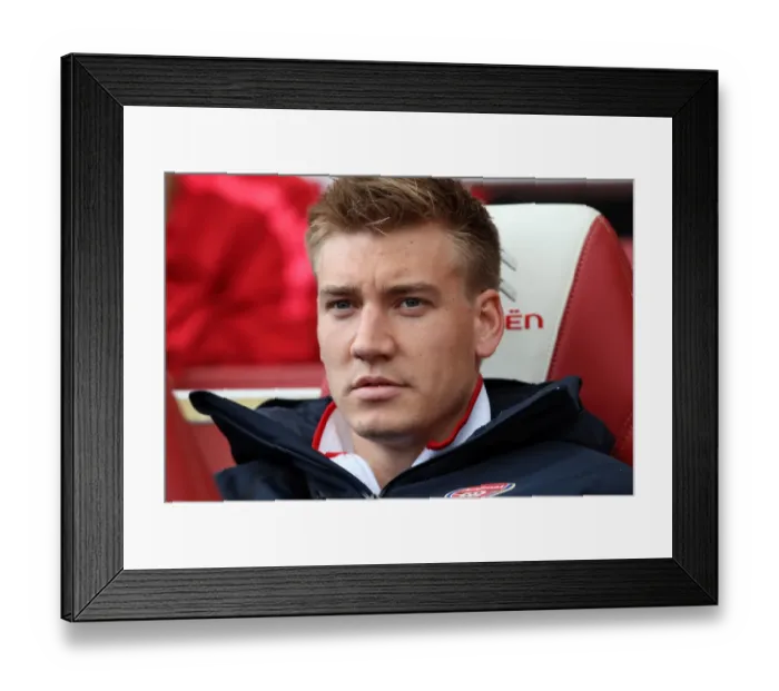 Framed Print : Nicklas Bendtner (Arsenal). Arsenal 2: 1 Birmingham City. Barclays Premier League