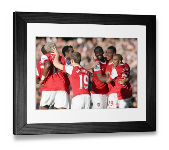 Framed Print : Marouane Chamakh celebrates scoring Arsenals 2nd goal with his team mates including Johan Djourou and Gael Clichy. Arsenal 2: 1 Birmingham City. Barclays Premier League. Emirates Stadium, 16 / 10 / 10. Credit : Arsenal Football Club / Framed Print : Marouane Chamakh celebrates scoring Arsenals 2nd goal with his team mates including Johan Djourou and Gael Clichy. Arsenal 2: 1 Birmingham City. Barclays Premier League. Emirates Stadium, 16 / 10 / 10. Credit : Arsenal Football Club /