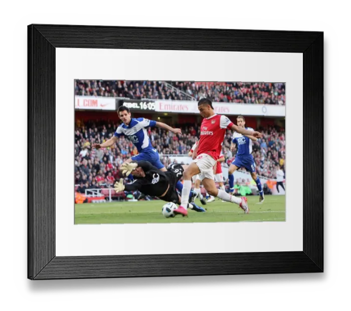 Framed Print : Marouane Chamakh scores Arsenals 2nd goal past Ben Foster and Scott Dann Framed Print : Marouane Chamakh scores Arsenals 2nd goal past Ben Foster and Scott Dann