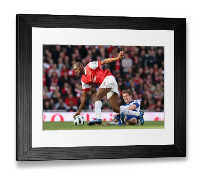 Framed Print : Abou Diaby and Alex Hleb Clash in Arsenal's 2:1 Victory over Birmingham City