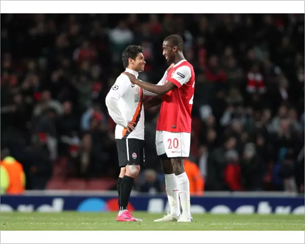 Johan Djourou (Arsenal) chats with Eduardo (Shaktar) the former Arsenal player after the match