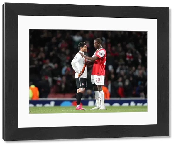 Johan Djourou (Arsenal) chats with Eduardo (Shaktar) the former Arsenal player after the match