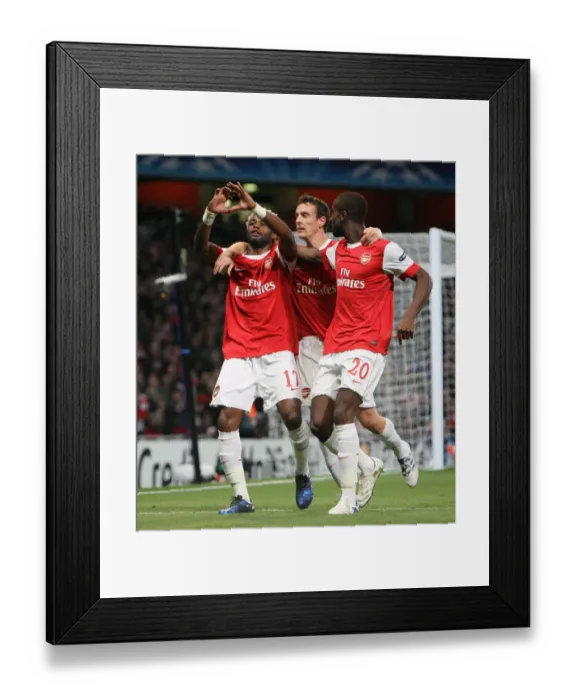 Framed Print : Arsenal's Unforgettable 5-1 Victory over Shaktar Donetsk: Alex Song's Thrilling Goal Celebration with Squillaci and Djourou Framed Print : Arsenal's Unforgettable 5-1 Victory over Shaktar Donetsk: Alex Song's Thrilling Goal Celebration with Squillaci and Djourou