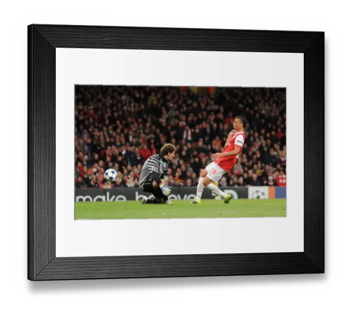 Framed Print : Marouane Chamakh shoots past Shakhtar goalkeeper Andriy Pyatov to score the 5th Arsenal goal