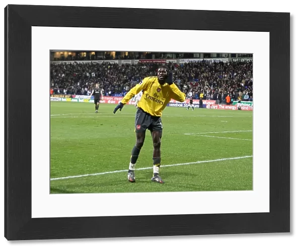 Emmanuel Adebayor celebrates scoring hte 3rd Arsenal goal