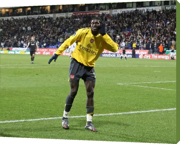 Emmanuel Adebayor celebrates scoring hte 3rd Arsenal goal