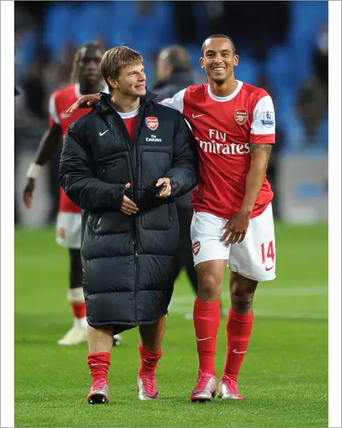 Andrey Arshavin and Theo Walcott (Arsenal) celebrate after the match. Manchester City 0