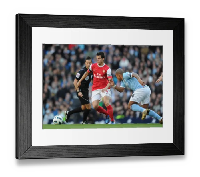 Framed Print : Cesc Fabregas (Arsenal) Nigel De Jong (Man City). Manchester City 0: 3 Arsenal