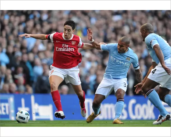 Sami Nasri (Arsenal) Nigel De Jong and Vincent Kompany (Man City). Manchester City 0