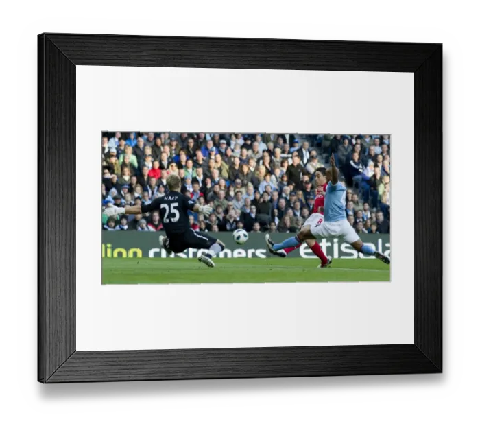 Framed Print : Sami Nasri shoots past Man City goalkeeper Joe Hart to score the 1st Arsenal goal Framed Print : Sami Nasri shoots past Man City goalkeeper Joe Hart to score the 1st Arsenal goal